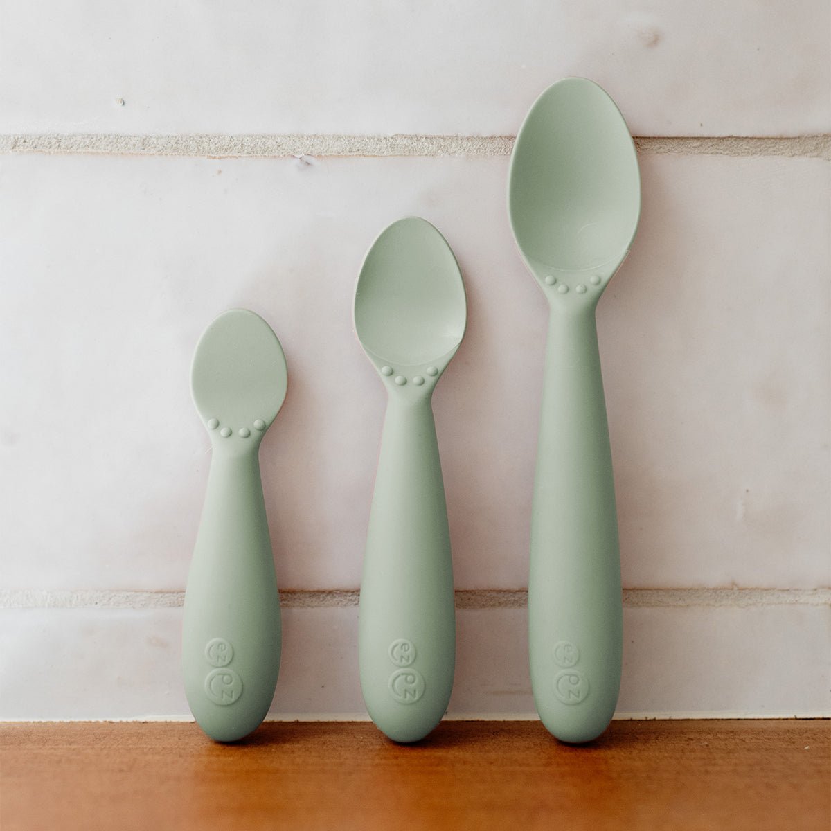 ezpz Developmental Utensil Set in Sage Hip Mommies