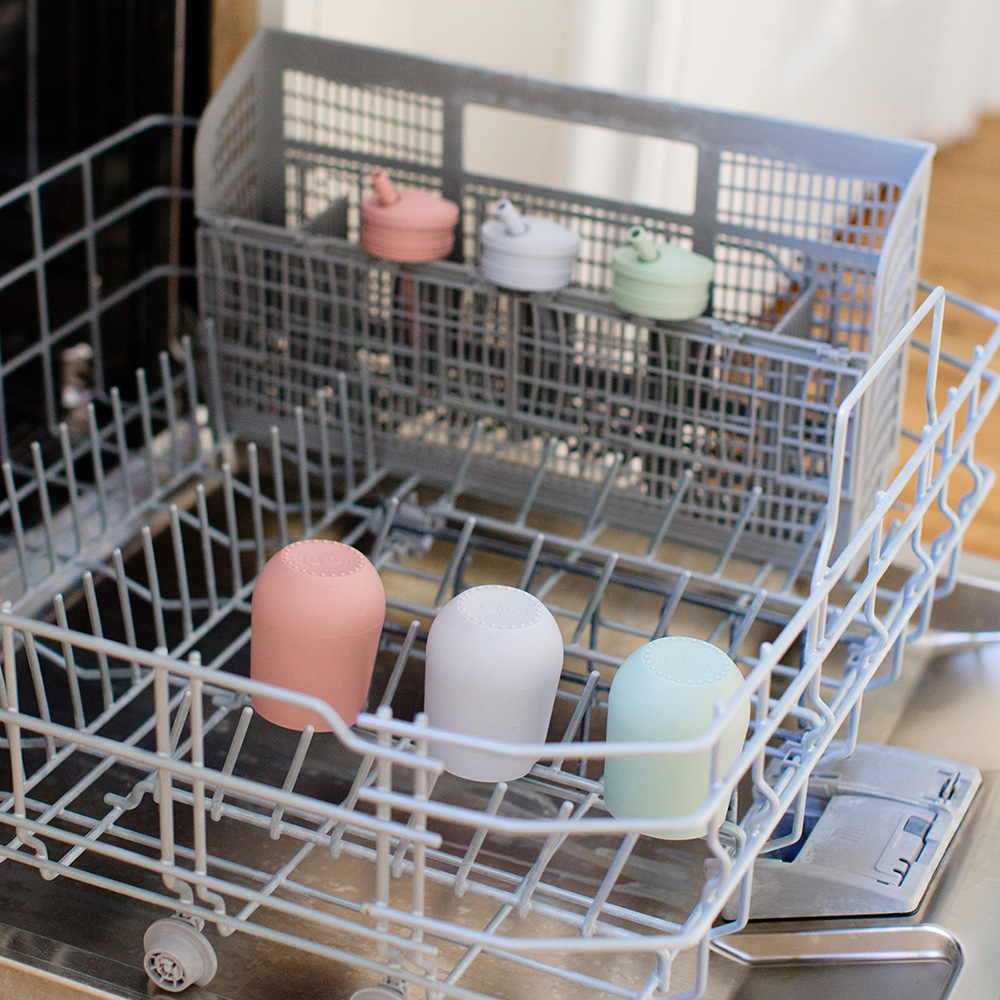 ezpz mini cups and training system in nordic colours in a dishwasher